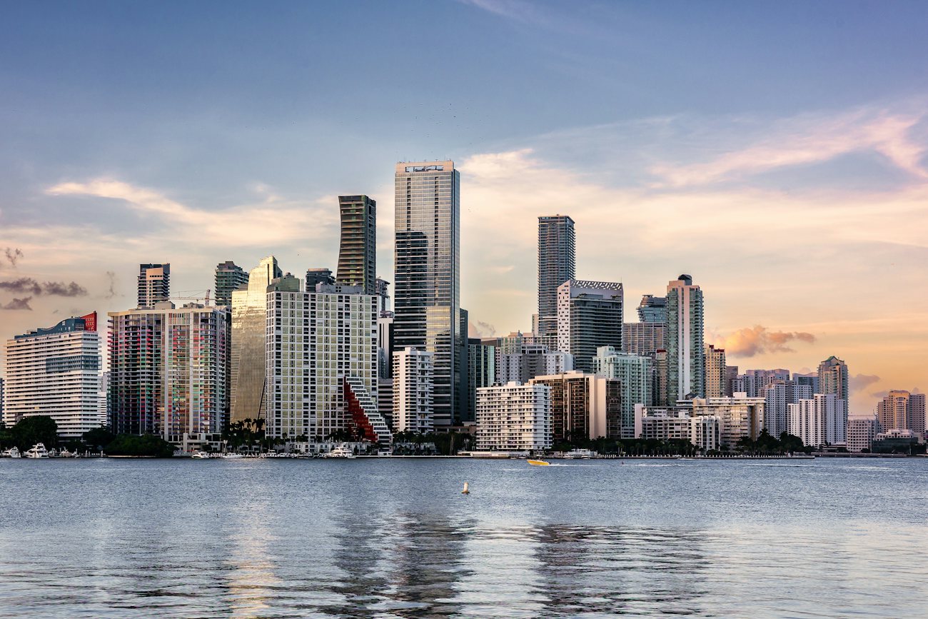 Brickell skyline reflected in Biscayne Bay at golden hour
